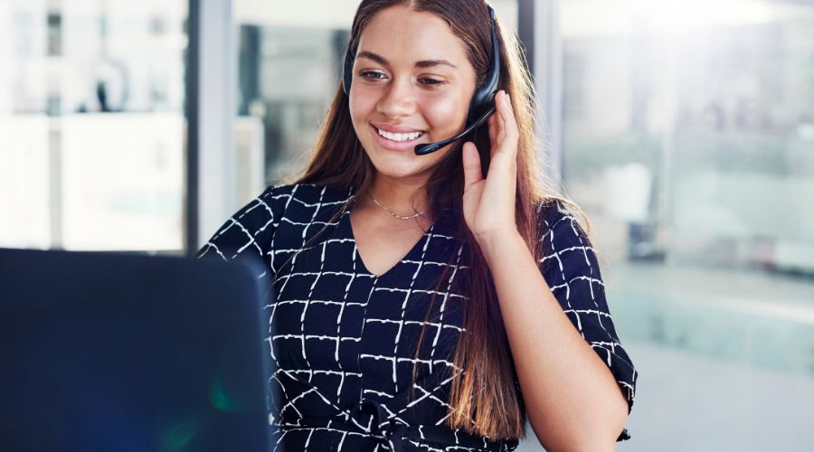 Professional virtual assistant woman wearing headset providing customer support and administrative services